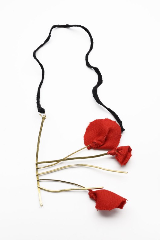 Catalina Brenes - "Pettunia", 2009. Necklace. Brass, fabric and silk. Photo courtesy of the artist. 