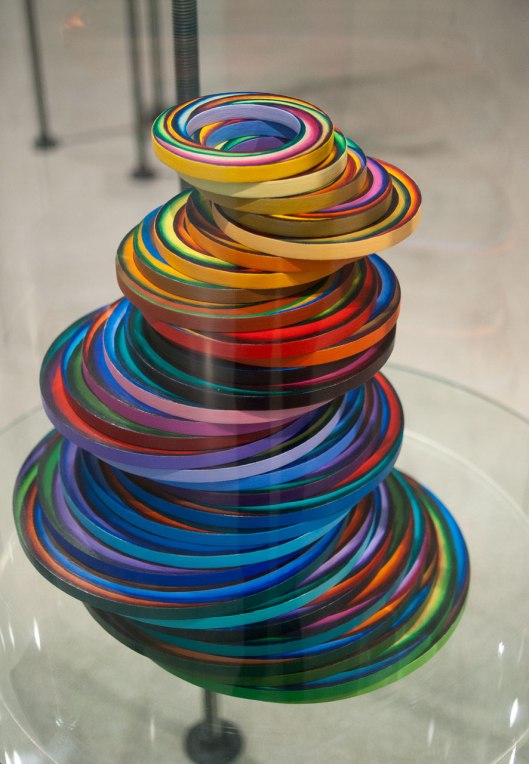 Marjorie Schick - Spiralling Disks (2006). Necklaces and bracelets: painted wood. Photo by Eleni Roumpou
