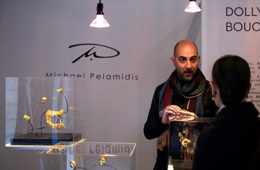 Michael Pelamidis at his stand. Photo by Eleni Roumpou